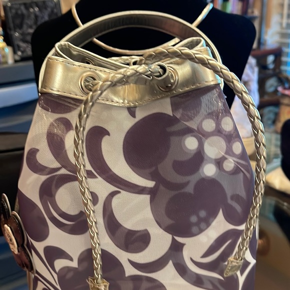 Vera Bradley Handbags - Vera Bradley nylon bag trimmed in silver accent. Bag size is11X8. Pre owned